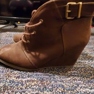 Brown wedge booties